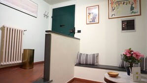 Comfort Apartment, 2 Bedrooms, City View | Living area | Flat-screen TV - Pieros'apartment (Lucca)
