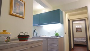 Comfort Apartment, 2 Bedrooms, City View | Private kitchenette | Coffee/tea maker, fridge, microwave, stovetop - Pieros'apartment (Lucca)