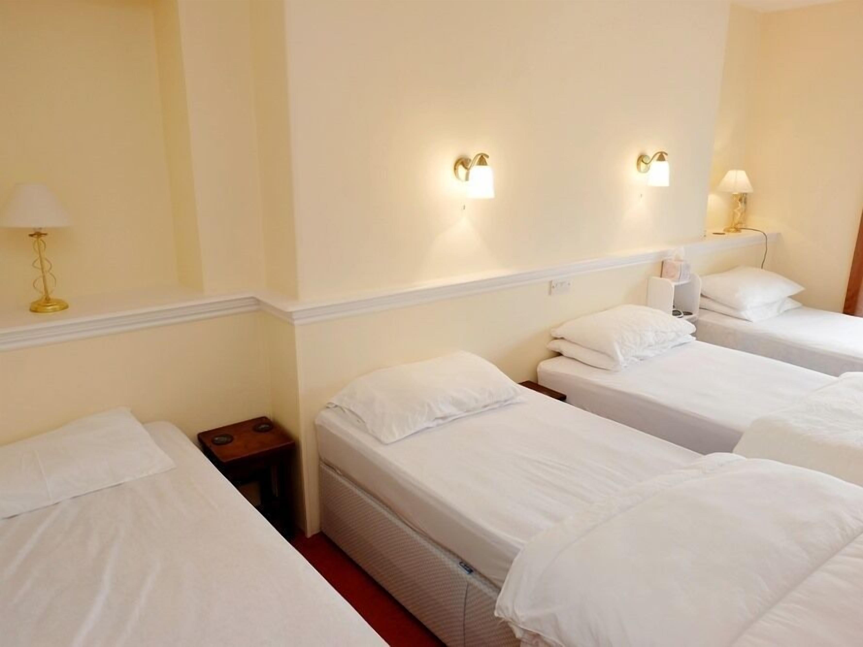 套房, 獨立浴室 (4 Single Beds) | 1 間臥室