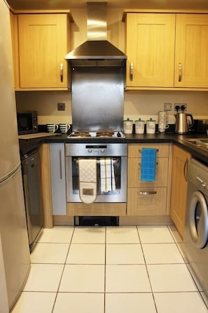 Luxury Apartment, 2 Bedrooms | Private kitchen | Fridge, microwave, oven, dishwasher