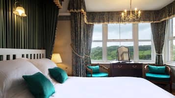 Premium bedding, desk, laptop workspace, soundproofing