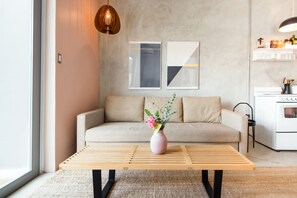 Apartment, 2 Bedrooms, Kitchenette, Ground Floor | Living area | Flat-screen TV - TROPICALIA by DW (San Juan)