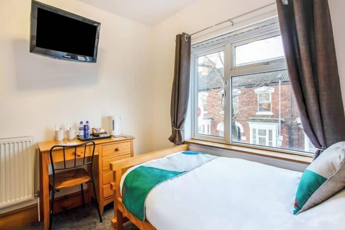 Desk, WiFi (free), bed sheets
