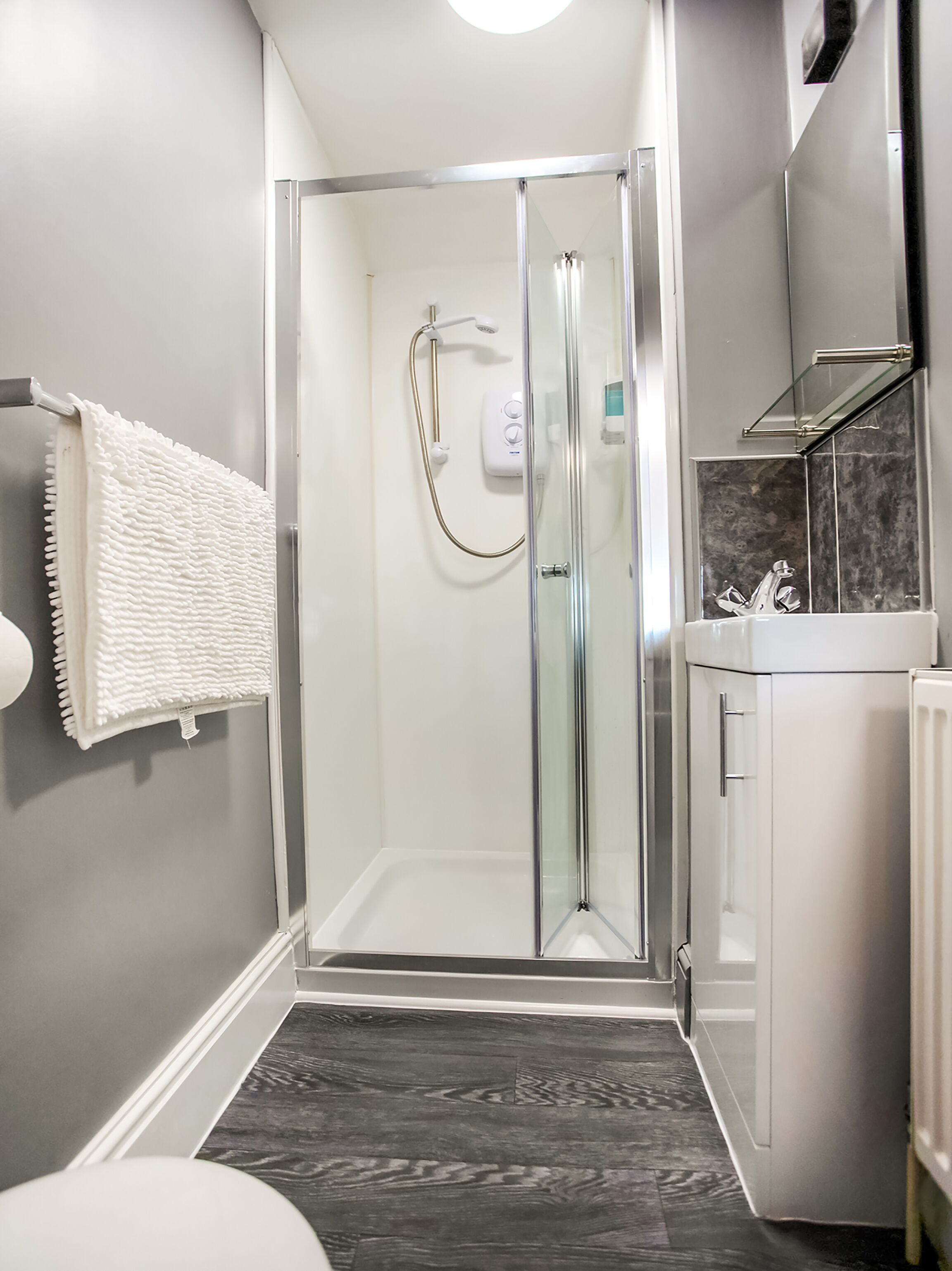 Shower, free toiletries, towels, soap