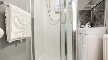 Shower, free toiletries, towels, soap