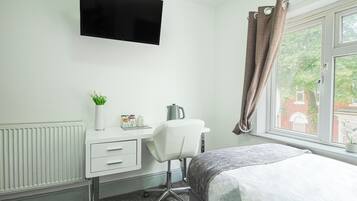 Desk, free WiFi, bed sheets