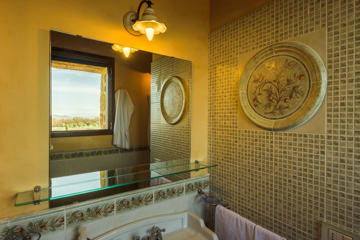 shower, rainfall showerhead, designer toiletries, hair dryer