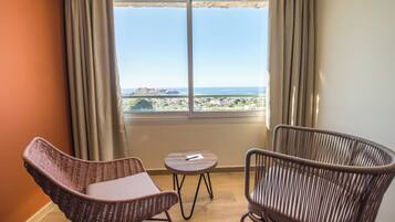 Chambre Cosy | Coin séjour | Télévision à écran plat