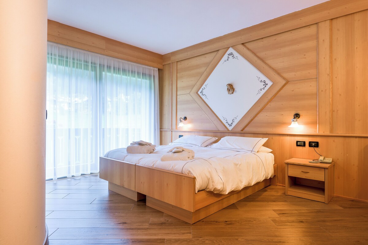 Habitación Confort doble (Comfort Relax Panorama) | Ropa de cama de alta calidad y edredones de plumas