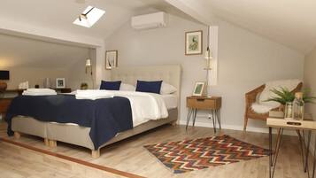 Apartment, 1 Bedroom | 1 bedroom, in-room safe, individually decorated, individually furnished