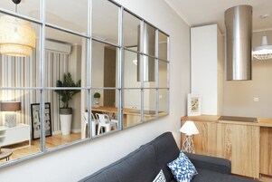 Deluxe Apartment, 1 Bedroom | Living area | Flat-screen TV