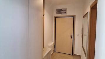 Family Suite, Multiple Beds, City View | Living area | Flat-screen TV