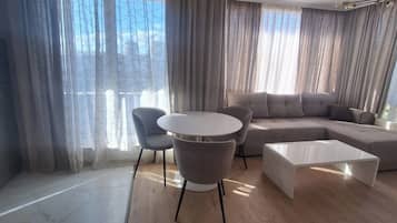 Superior Apartment, Multiple Beds, Park View | Living area | Flat-screen TV