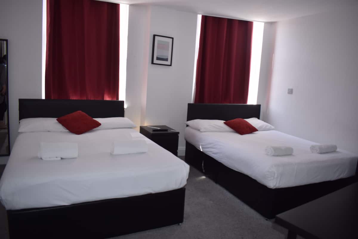 Desk, laptop workspace, free WiFi, bed sheets