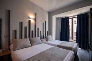 Triple Room, City View | Minibar, in-room safe, soundproofing, free WiFi - Hostal El Carmen (Madrid)