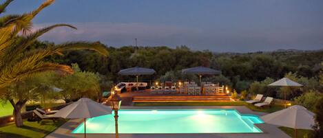 Indoor pool, outdoor pool, pool umbrellas, pool loungers