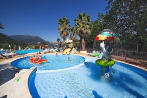 Seasonal outdoor pool, open 10 AM to 6:00 PM, pool umbrellas