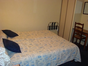 Twin Room | Blackout drapes, iron/ironing board, free WiFi, bed sheets