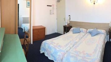 Twin Room | Blackout drapes, iron/ironing board, free WiFi, bed sheets