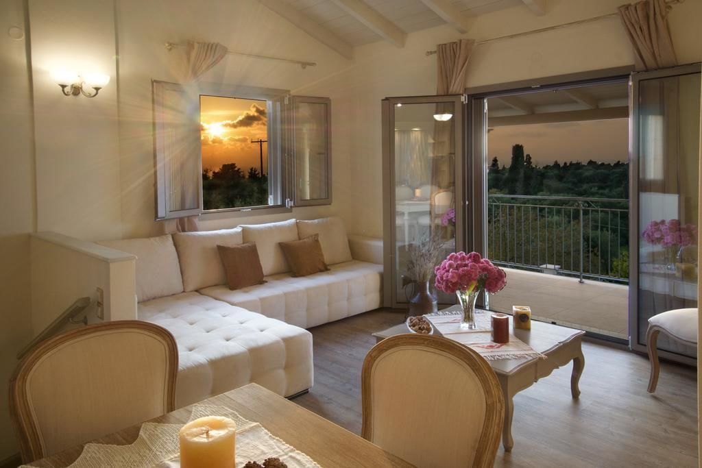 Villa, vista mare | Area soggiorno | TV a schermo piatto