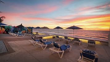 Outdoor pool, open 9:00 AM to 10:00 PM, pool umbrellas, sun loungers