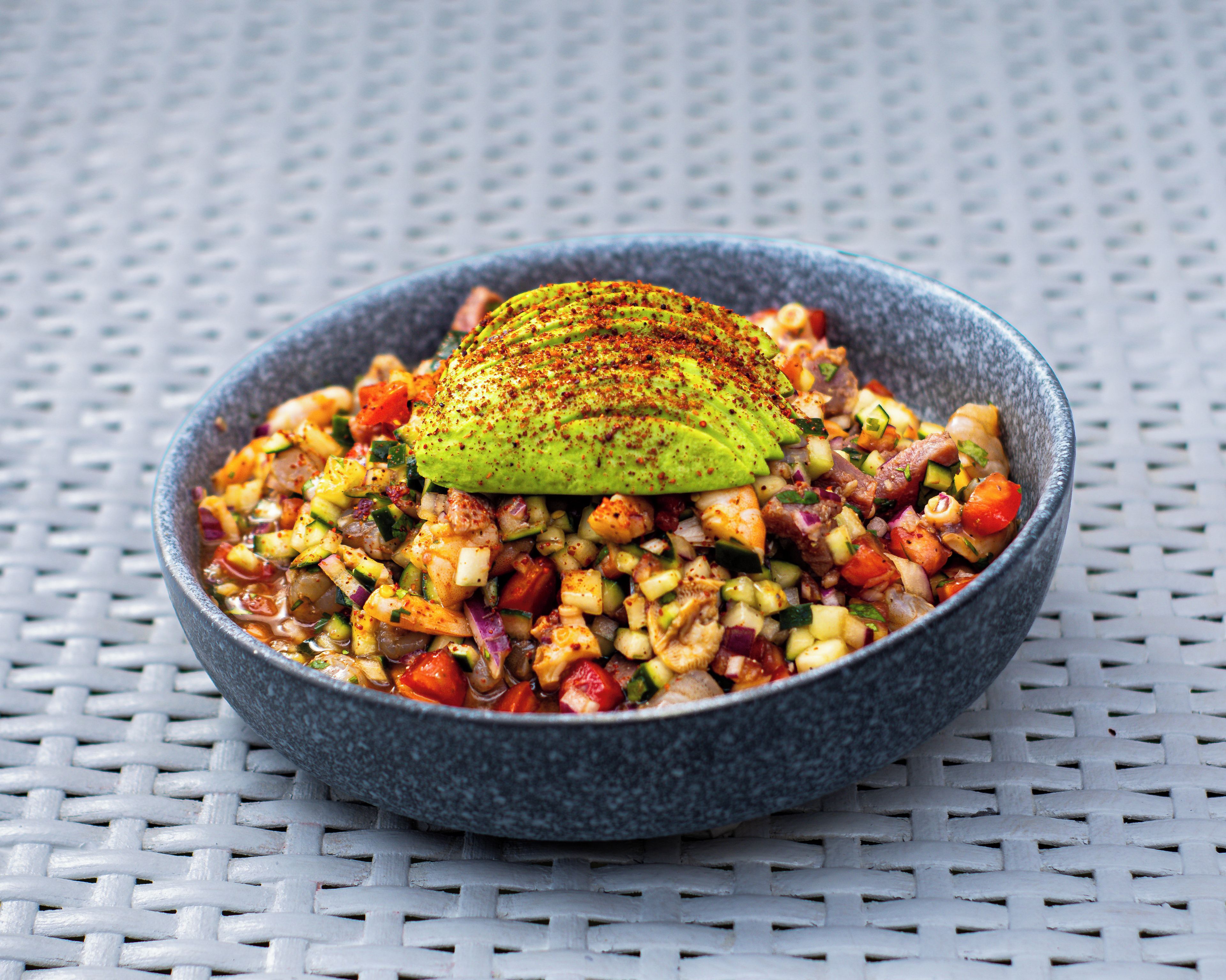 A bowl of food with a textured surface.