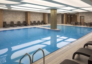 Indoor pool, open 8:30 AM to 10:30 PM, sun loungers - Ramada Plaza by Wyndham Rize (Rize)