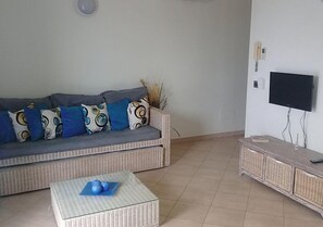 Appartamento, 1 camera da letto (Apt 1B) | Soggiorno | TV a schermo piatto