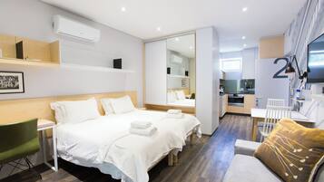 Premium bedding, in-room safe, individually decorated