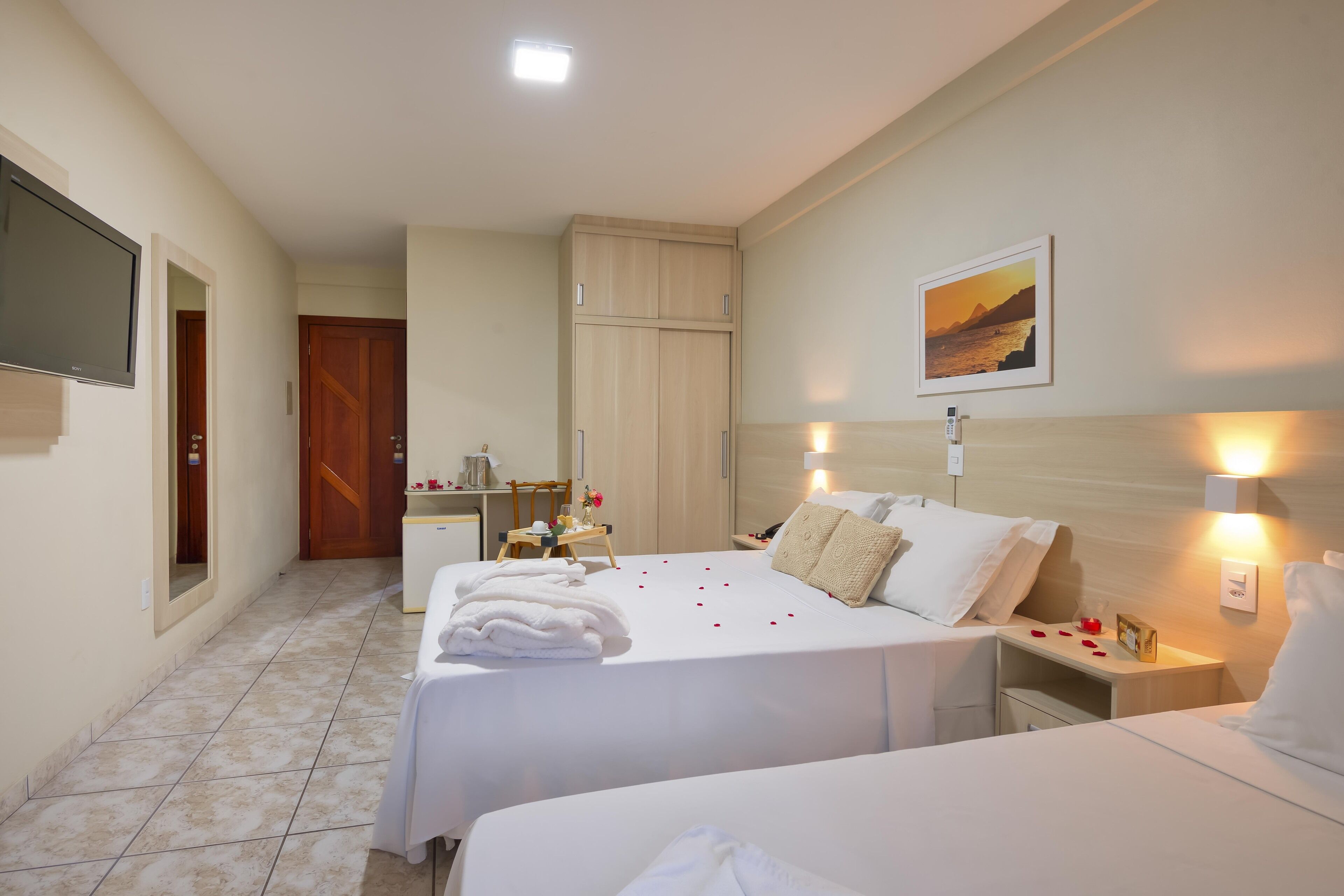 standard apartment, beach view | minibar, desk, blackout curtains, iron/ironing board