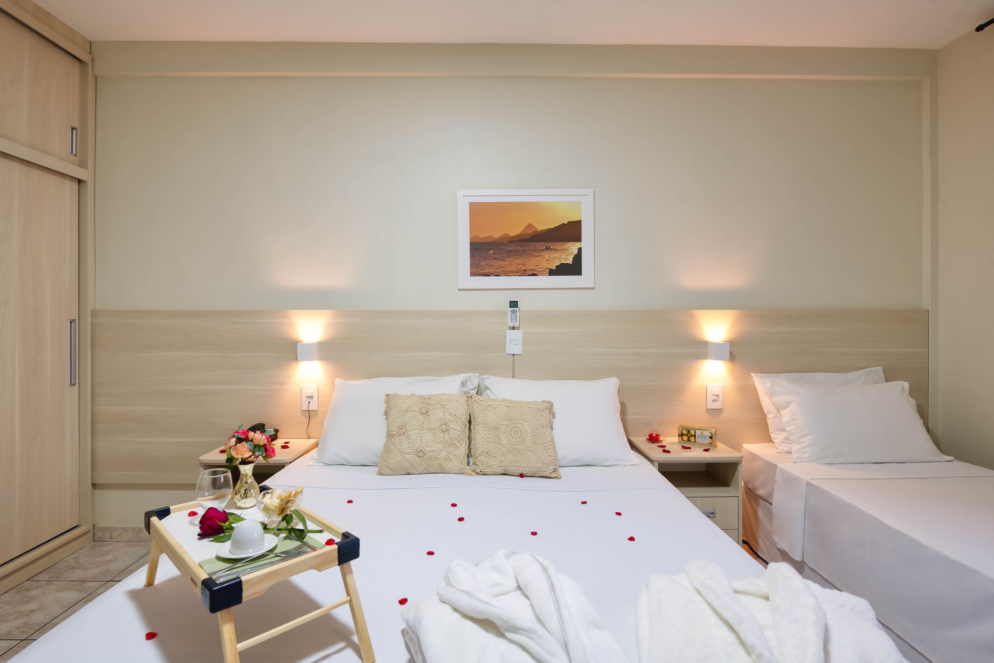 standard apartment, beach view | minibar, desk, blackout curtains, iron/ironing board