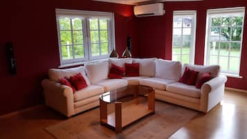 Luxury House, 4 Bedrooms, Garden View | Living area | LED TV, fireplace, DVD player