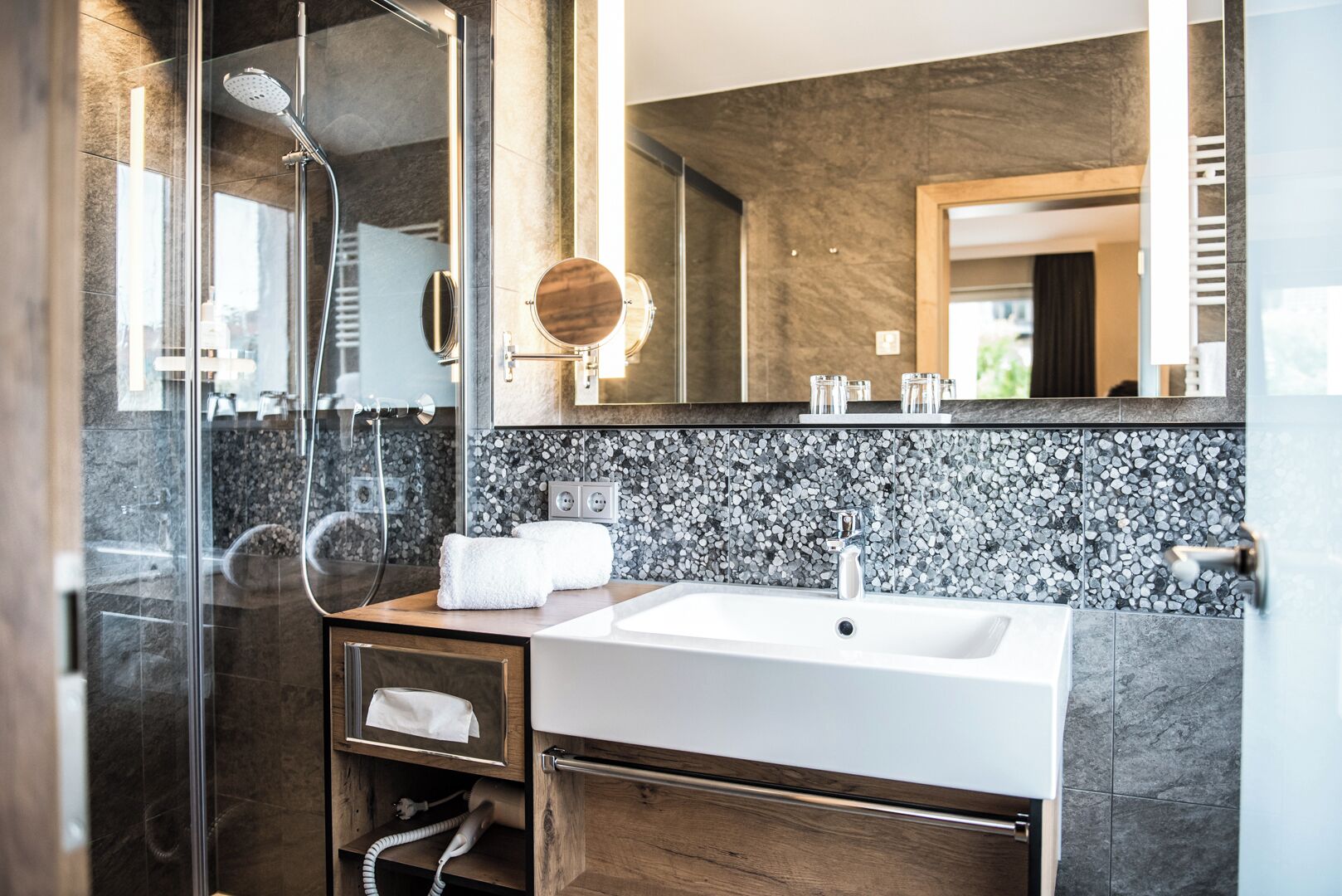 premium double room | bathroom | hair dryer, dressing gowns, towels