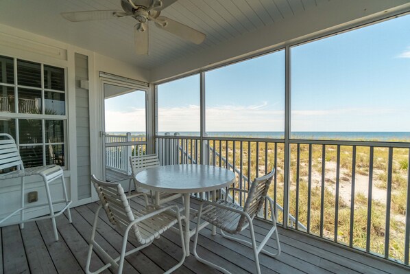 Outdoor dining - A Fabulous view and only steps from the Pool and the sandy beach.  B1311A (Cape Haze)