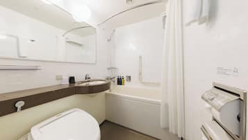Combined shower/tub, deep soaking tub, hair dryer, slippers