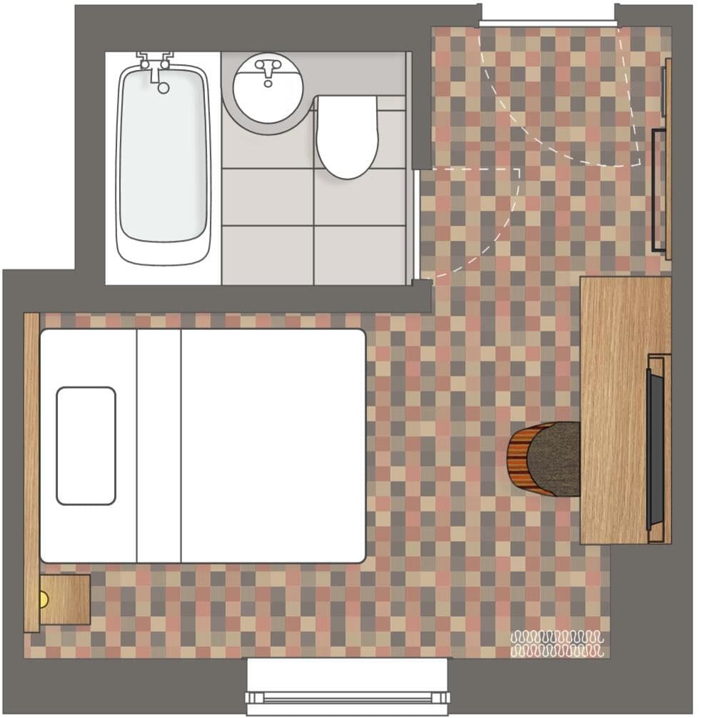 A bathroom with a bathtub, toilet, and sink.
