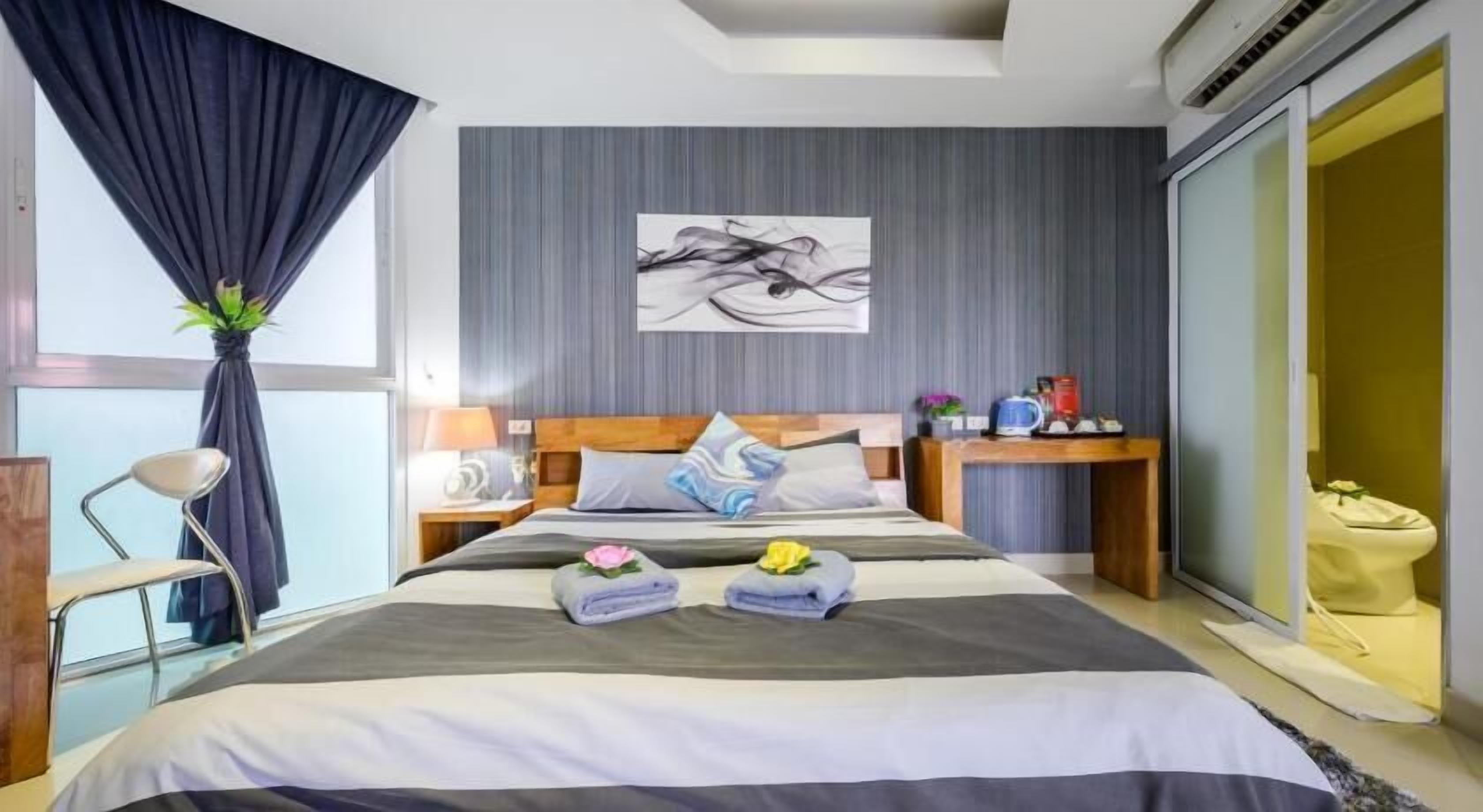 Down comforters, memory foam beds, in-room safe, desk