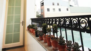 Chambre quadruple familiale, balcon | Literie de qualité, accès au Wi-Fi (inclus), literie fournie