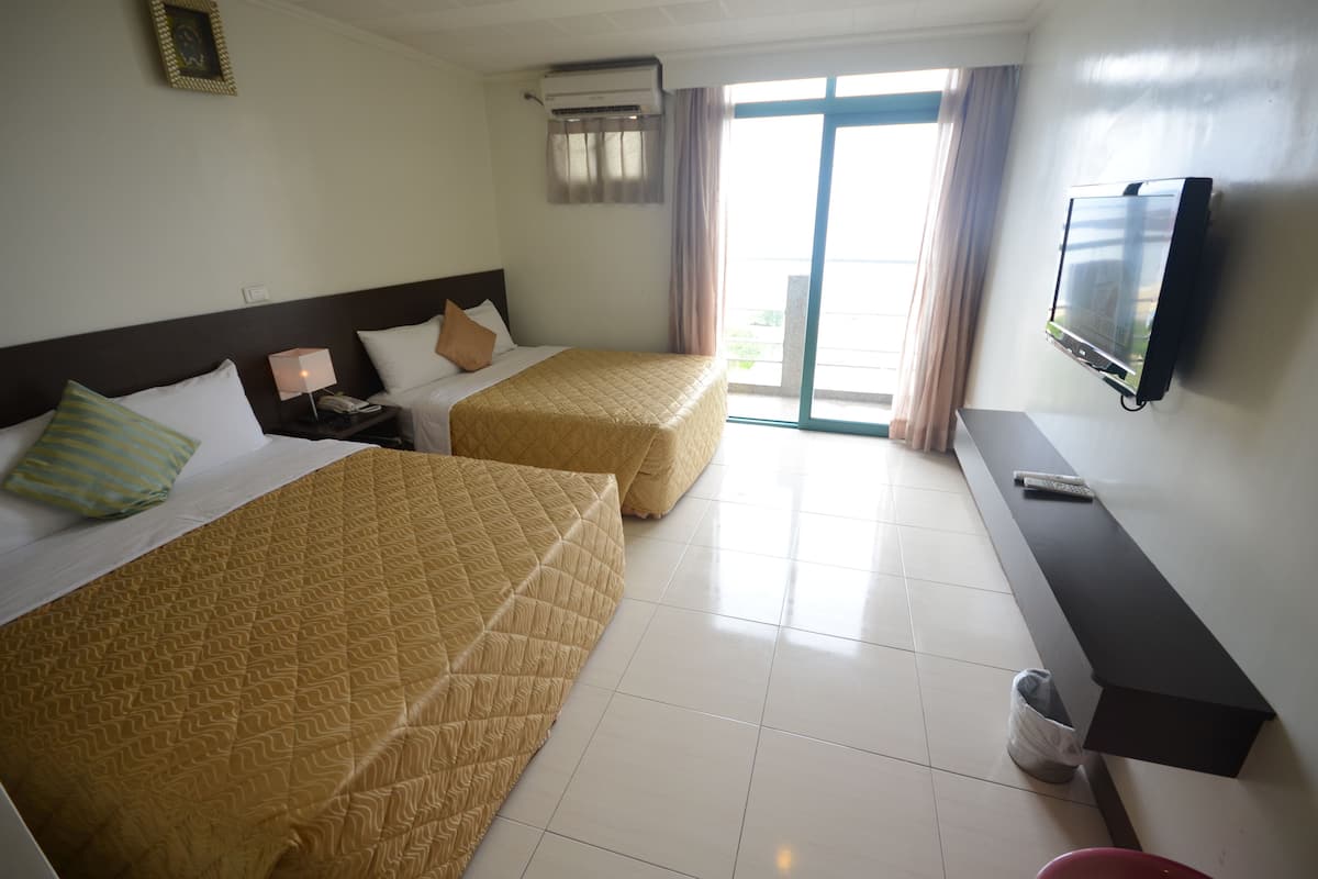 Standard Quadruple Room | Blackout curtains, free WiFi, bed sheets