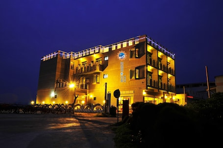 Front of property - evening/night. Shin Gang Jing-Ya Pai House