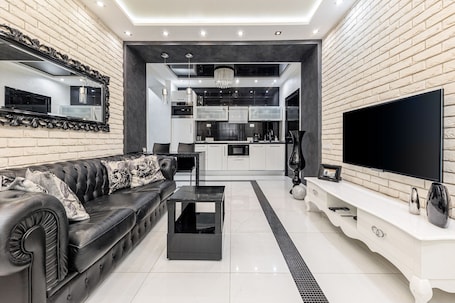 Luxury Apartment, 1 Bedroom (Lenina Street 11) | Living area | 42-inch flat-screen TV with cable channels, TV. Royal apartments Minsk