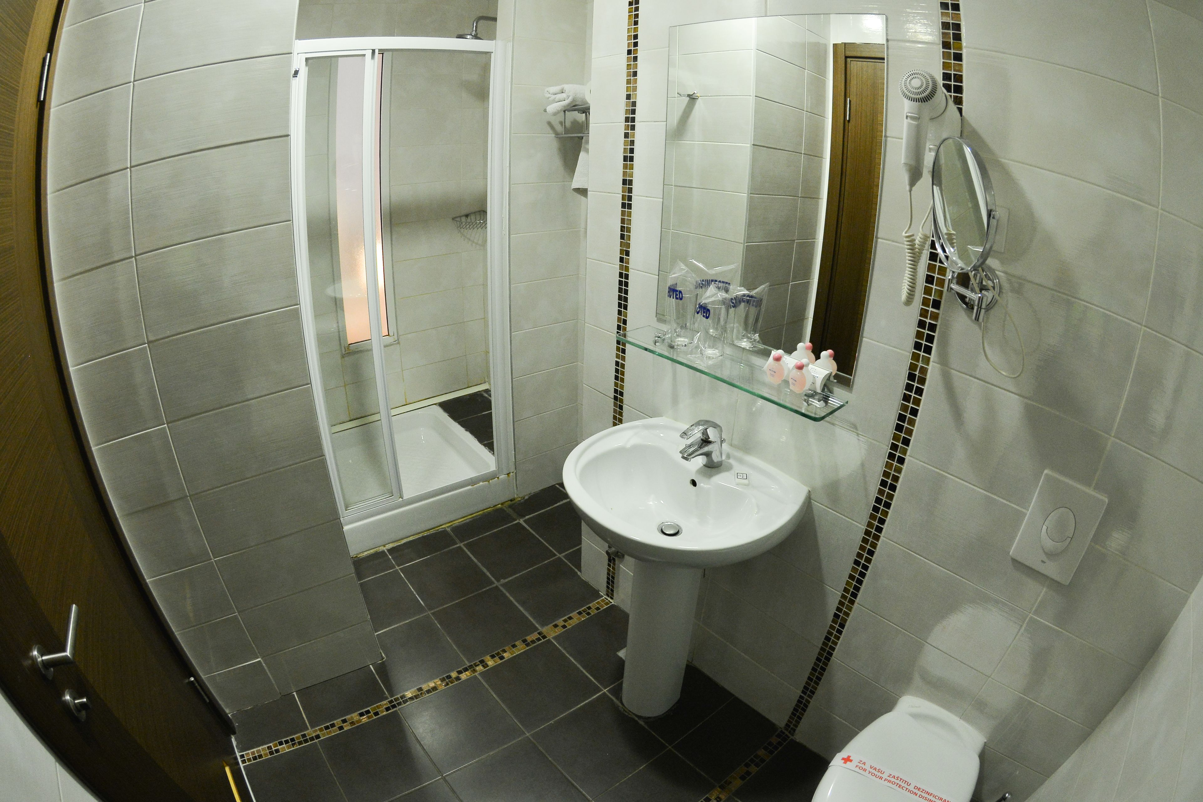 shower, free toiletries, hair dryer, towels