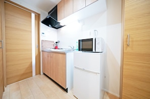 Apartment | Private kitchen | Fridge, microwave, stovetop, electric kettle