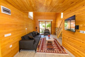 Deluxe Bungalow | Living area | LCD TV