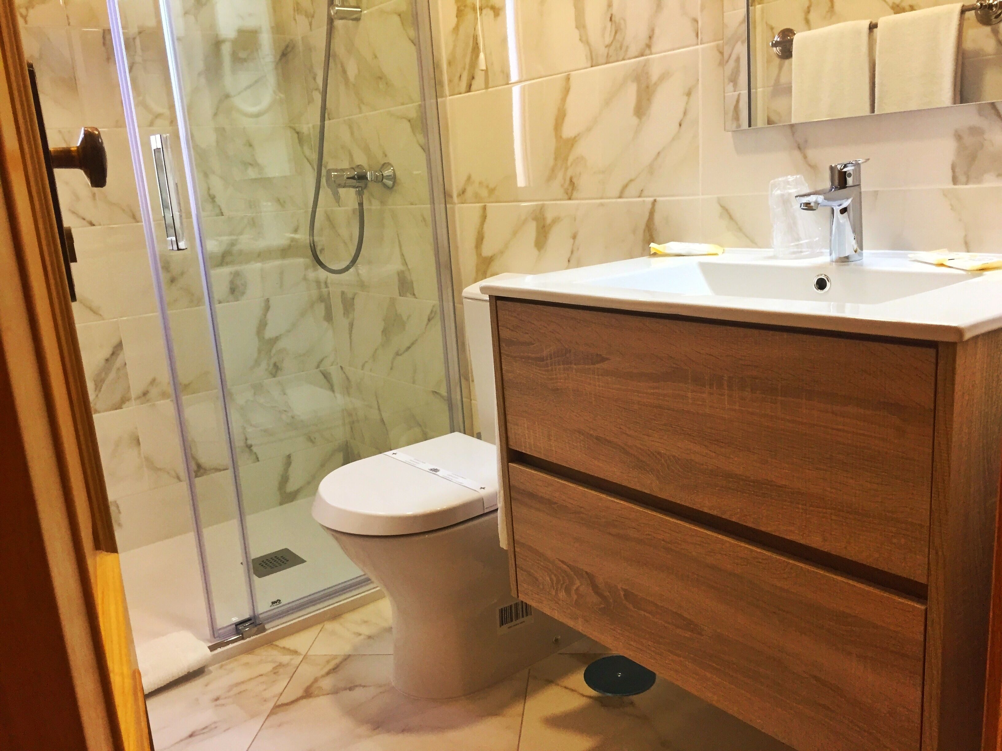 traditional twin room | bathroom | free toiletries, hair dryer, towels
