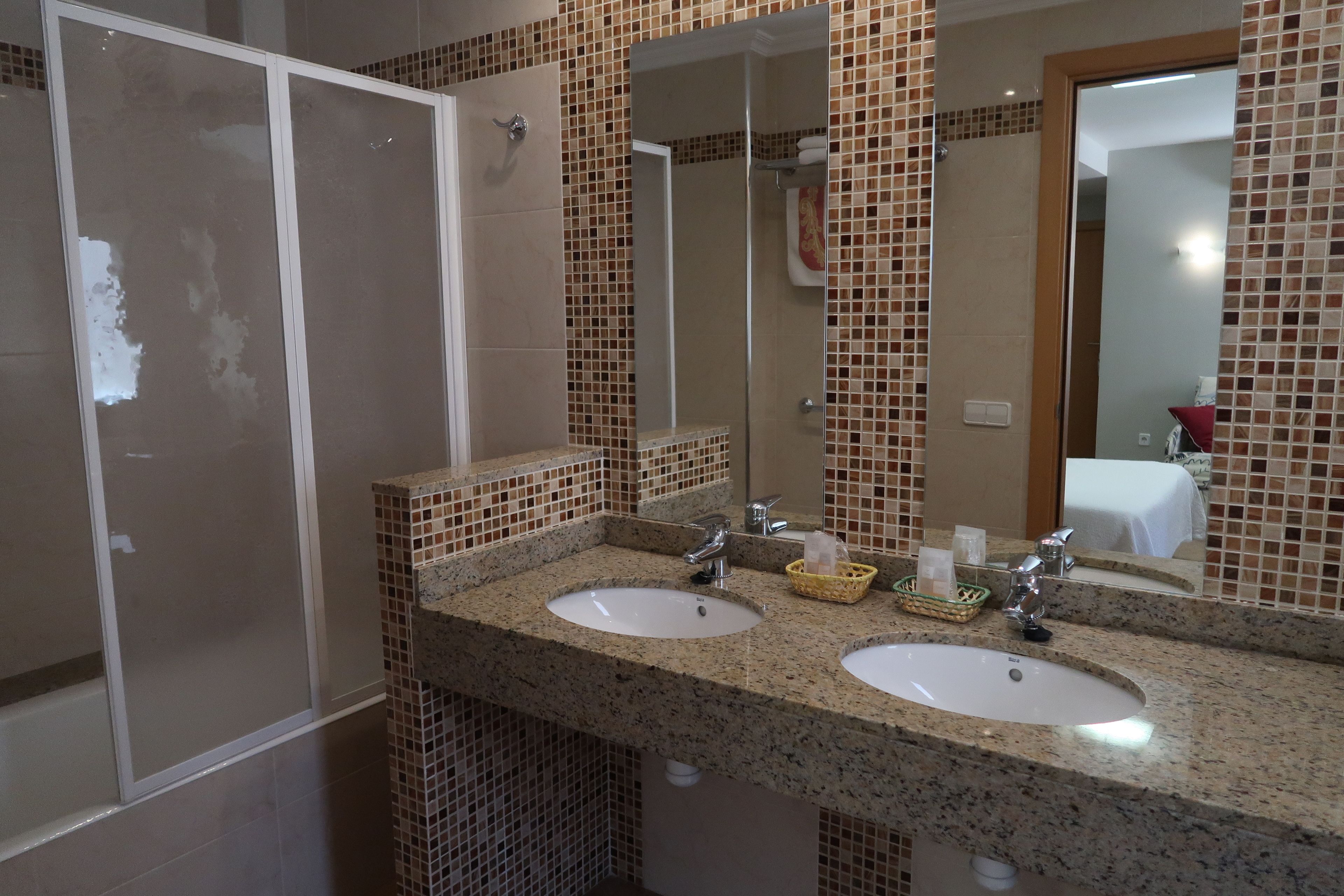 superior double room | bathroom | free toiletries, hair dryer, towels