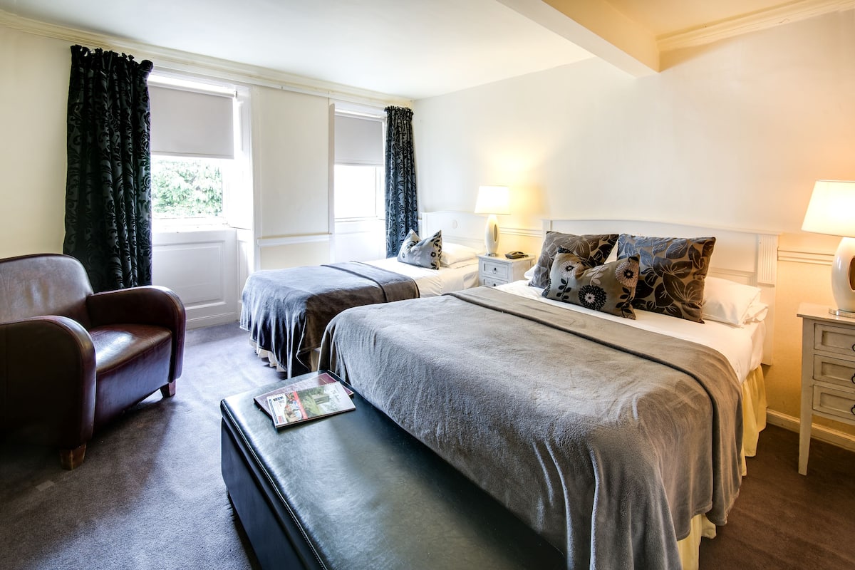 Family Room (With Shower) | Premium bedding, desk, iron/ironing board (on request), WiFi (free)
