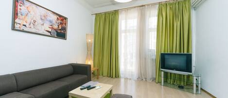 Apartment, 2 Bedrooms (Gorkogo st. 12) | Living room | Flat-screen TV