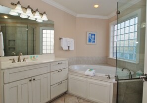 Bathtub, jetted tub, hair dryer, towels