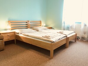 Classic Triple Room, Refrigerator, Courtyard Area | Desk, free WiFi, bed sheets - Rusovský penzión (Bratislava)